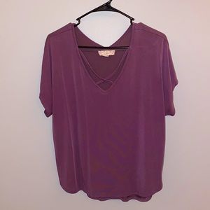 Purple V-neck t-shirt with cross in front